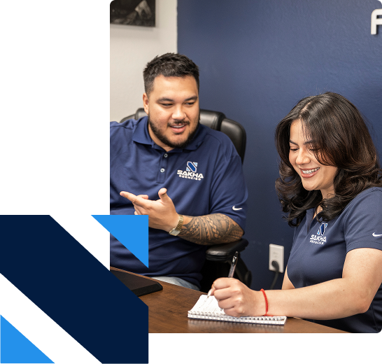 Sakha Agencies team helping a Las Vegas customer review coverage options.