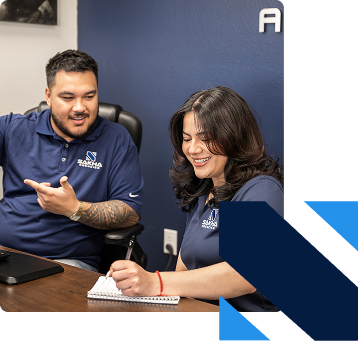 Sakha Agencies team helping a Las Vegas customer review coverage options.